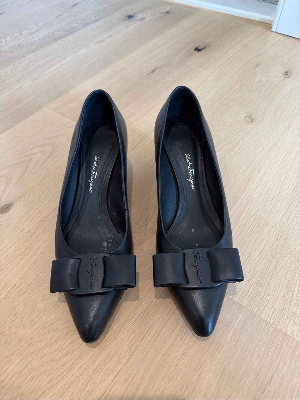 Salvatore Ferragamo Black Pointed Leather Flats with Signature Bow Accent